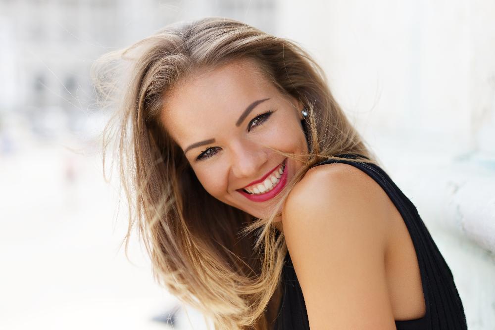 woman with red liptstick smiling | dentist foothill ranch ca